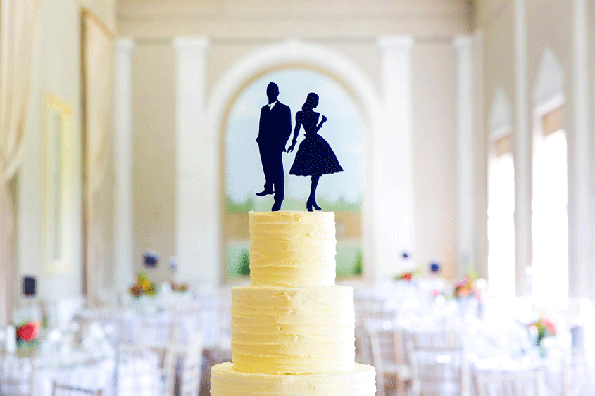 wedding cake with silhouette topper